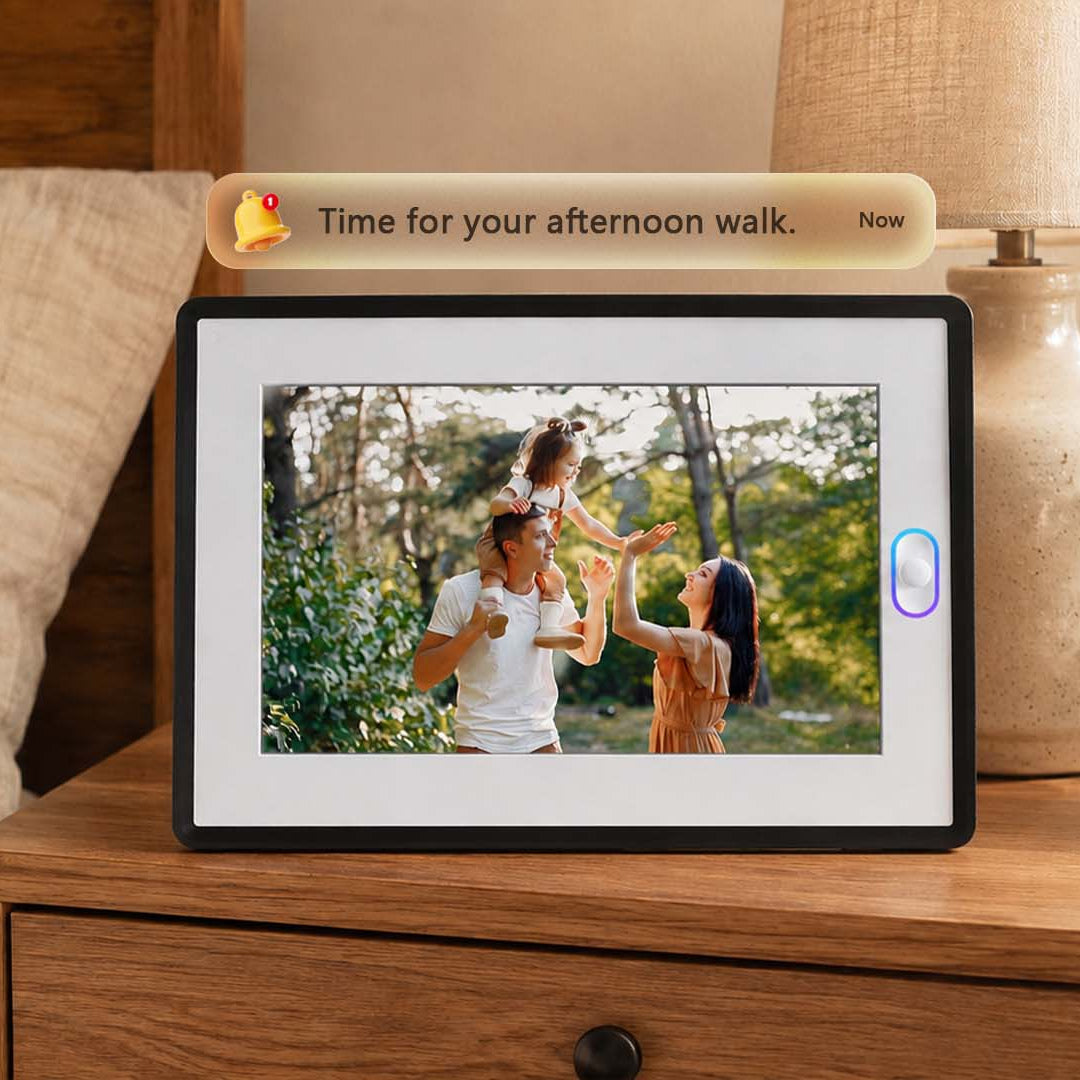AmivoFrame smart digital photo frame displaying a family photo and a reminder for an afternoon walk.