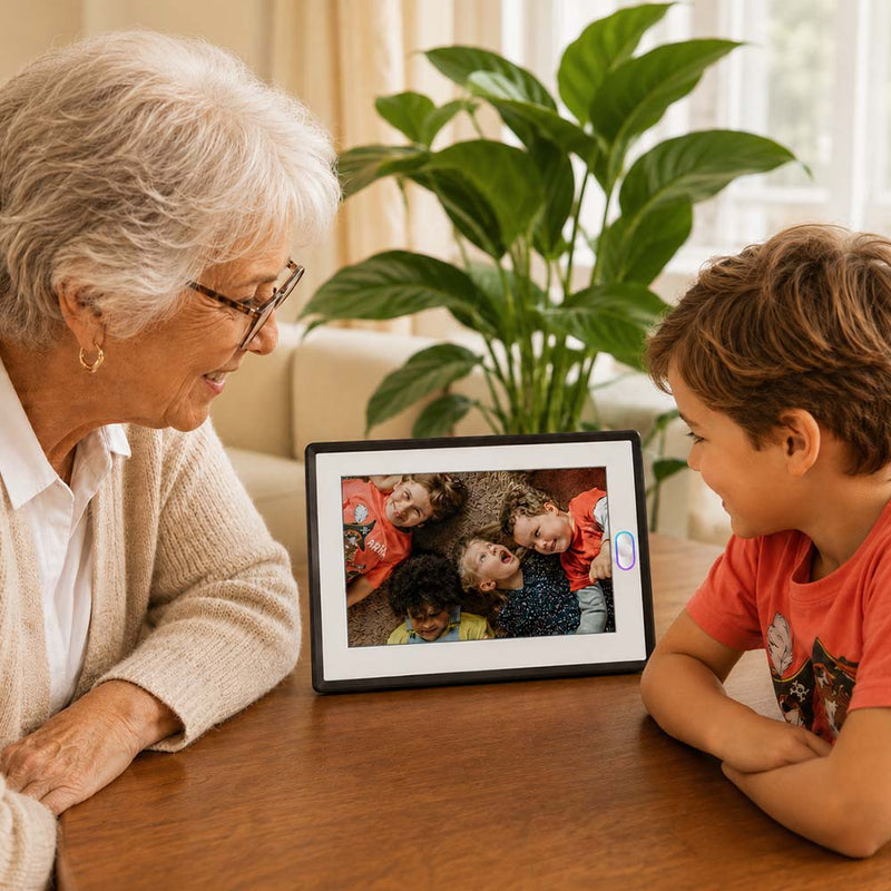 A wireless photo frame displaying a family portrait on a coffee table, serving as a lovely mother's day gift ideas display.
